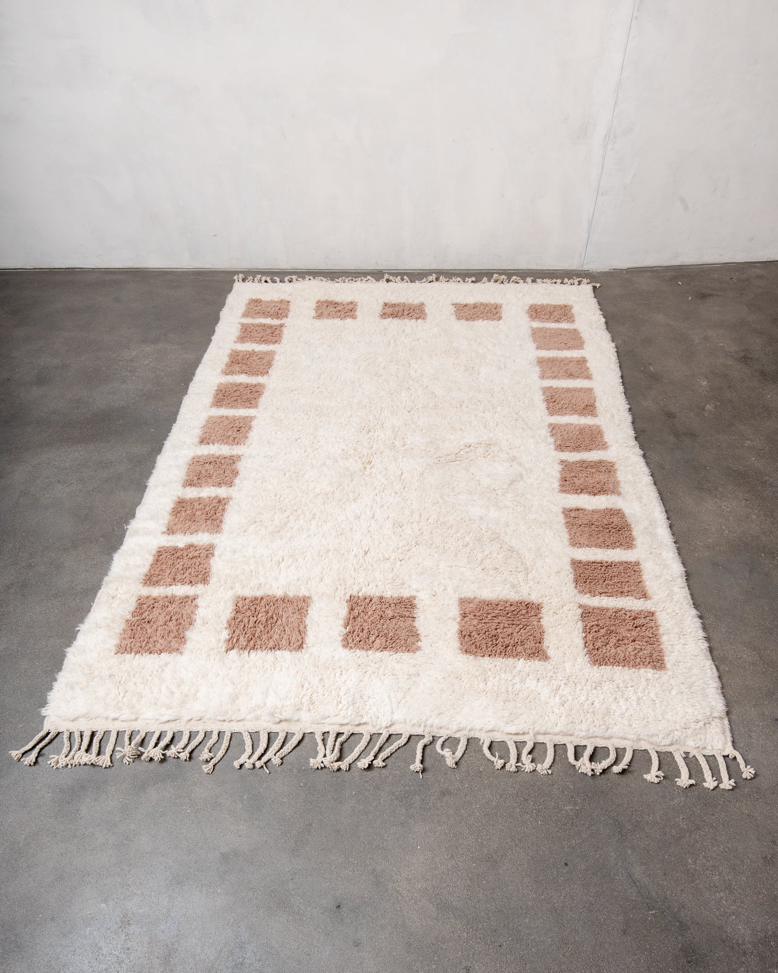 Modern, designer, handcrafted Berber rug from Morocco. Beniourain carpet with beautiful colours and patterns and fluffy wool texture.